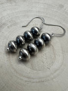 Bryannen Halwood Navajo Pearl Earrings — 2" Sterling Silver (Handcrafted by Navajo Artist) - Cowhide and Conchos
