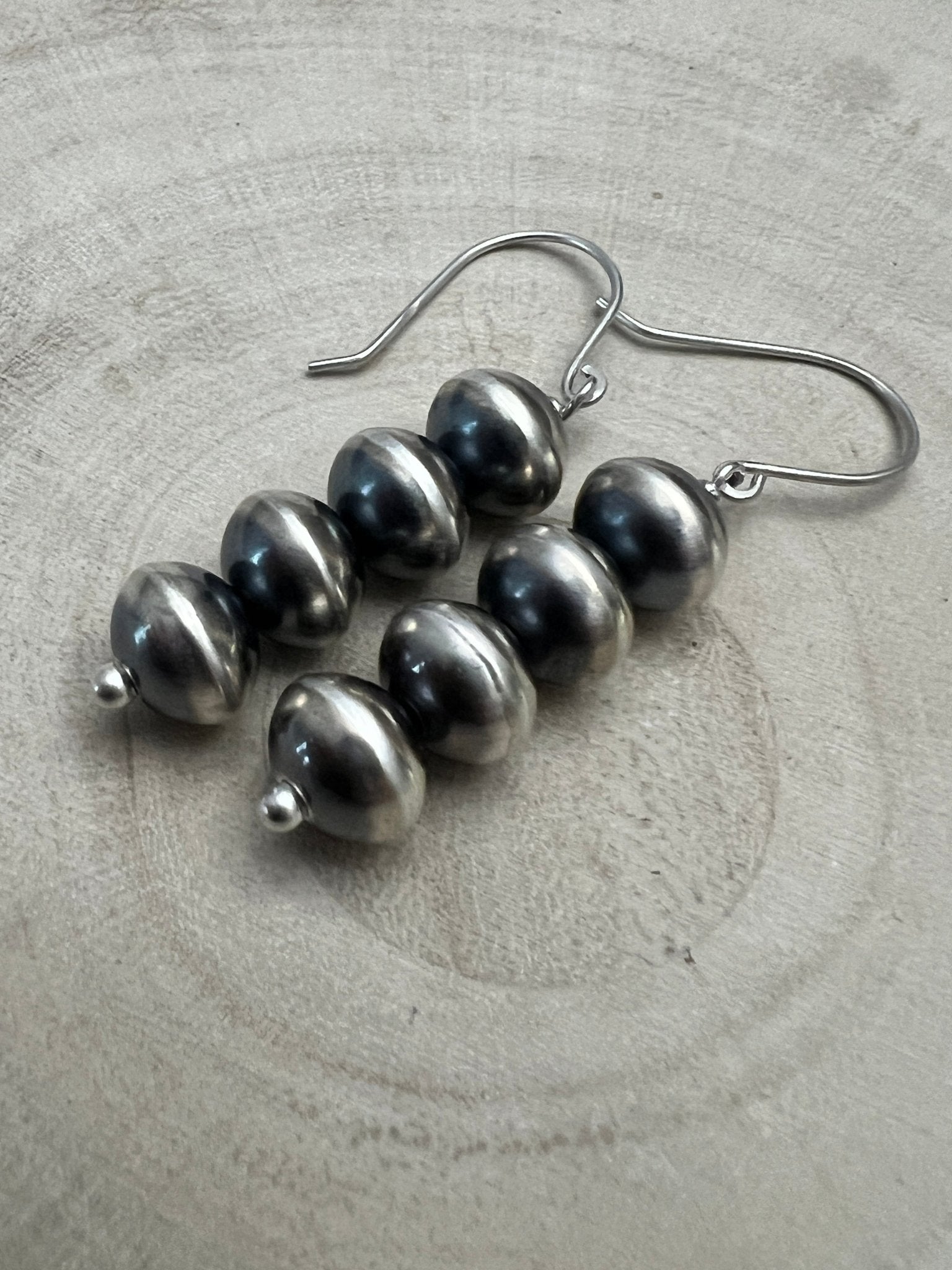 Bryannen Halwood Navajo Pearl Earrings — 2" Sterling Silver (Handcrafted by Navajo Artist) - Cowhide and Conchos