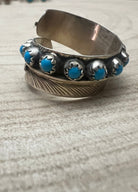 Chester Charley Navajo Handmade Kingman Turquoise Feather Adjustable Ring - Cowhide and Conchos
