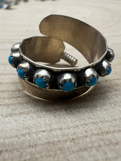 Chester Charley Navajo Handmade Kingman Turquoise Feather Adjustable Ring - Cowhide and Conchos