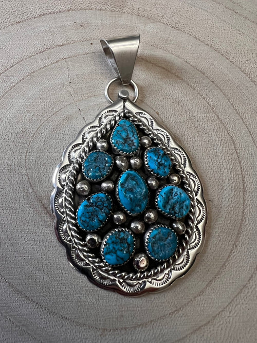 Chester Charley Turquoise & Sterling Silver Pendant - Cowhide and Conchos
