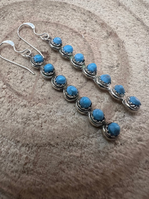 Cordelia Waknwa Zuni Handmade Sterling and Kingman Turquoise Dangle Earrings - Cowhide and Conchos