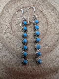 Cordelia Waknwa Zuni Handmade Sterling and Kingman Turquoise Dangle Earrings - Cowhide and Conchos