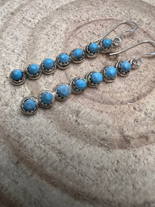 Cordelia Waknwa Zuni Handmade Sterling and Kingman Turquoise Dangle Earrings - Cowhide and Conchos