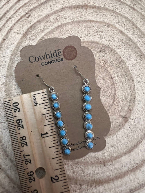 Cordelia Waknwa Zuni Handmade Sterling and Kingman Turquoise Dangle Earrings - Cowhide and Conchos