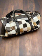 Cowhide Patch Duffle Bag - Cowhide and Conchos