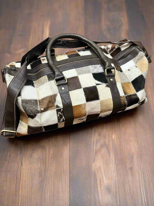 Cowhide Patch Duffle Bag - Cowhide and Conchos