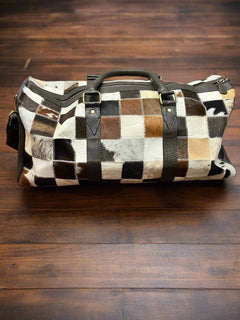 Cowhide Patch Duffle Bag - Cowhide and Conchos