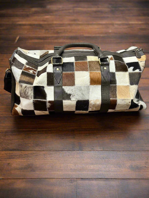Cowhide Patch Duffle Bag - Cowhide and Conchos