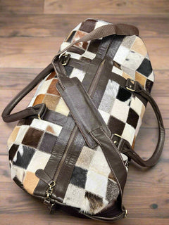 Cowhide Patch Duffle Bag - Cowhide and Conchos