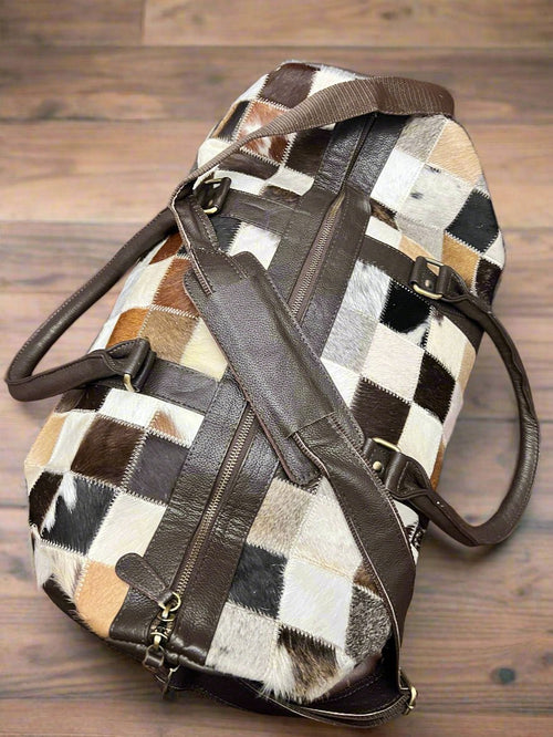 Cowhide Patch Duffle Bag - Cowhide and Conchos