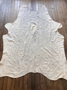 Cowhide Rug - 7' by 5' - Cowhide and Conchos
