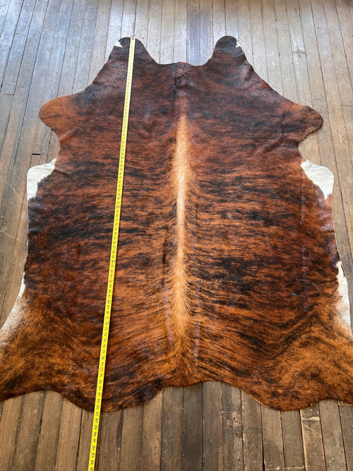 Cowhide Rug - 7' by 5' - Cowhide and Conchos