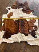 Cowhide Rug1 - 6.5 ft by 4.5 ft. - Cowhide and Conchos