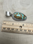Daniel Benally Navajo Sterling Silver Pendant with 8 Mine Turquoise — 2 1/4" × 1" (Hallmark) - Cowhide and Conchos