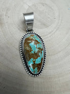 Daniel Benally Navajo Sterling Silver Pendant with 8 Mine Turquoise — 2 1/4" × 1" (Hallmark) - Cowhide and Conchos