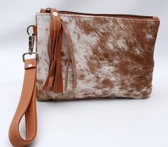 Dark Red Spotted Cowhide Clutch - Cowhide and Conchos