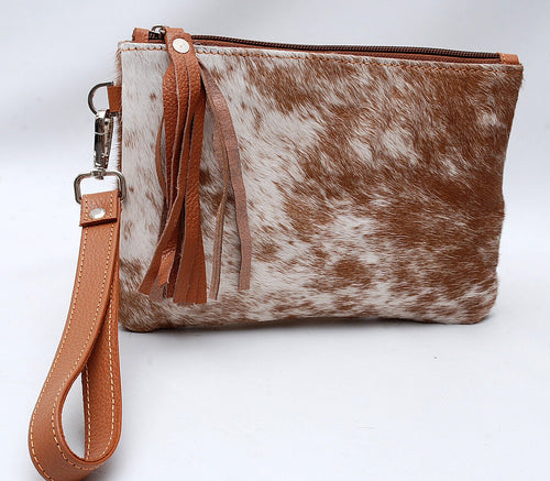 Dark Red Spotted Cowhide Clutch - Cowhide and Conchos