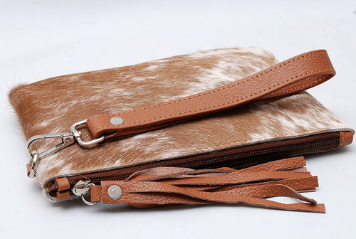 Dark Red Spotted Cowhide Clutch - Cowhide and Conchos