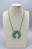 Darrin Livingston Navajo Naja Pendant Sterling Silver Necklace — 18" Chain with Sonoran Mountain Turquoise (2" × 2" Naja, Hallmarked, Heirloom Flagship) - Cowhide and Conchos