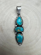 Darrin Livingston Navajo Sterling Silver Pendant with Natural Royston Turquoise — 3" × 3/4" (Hallmark) - Cowhide and Conchos