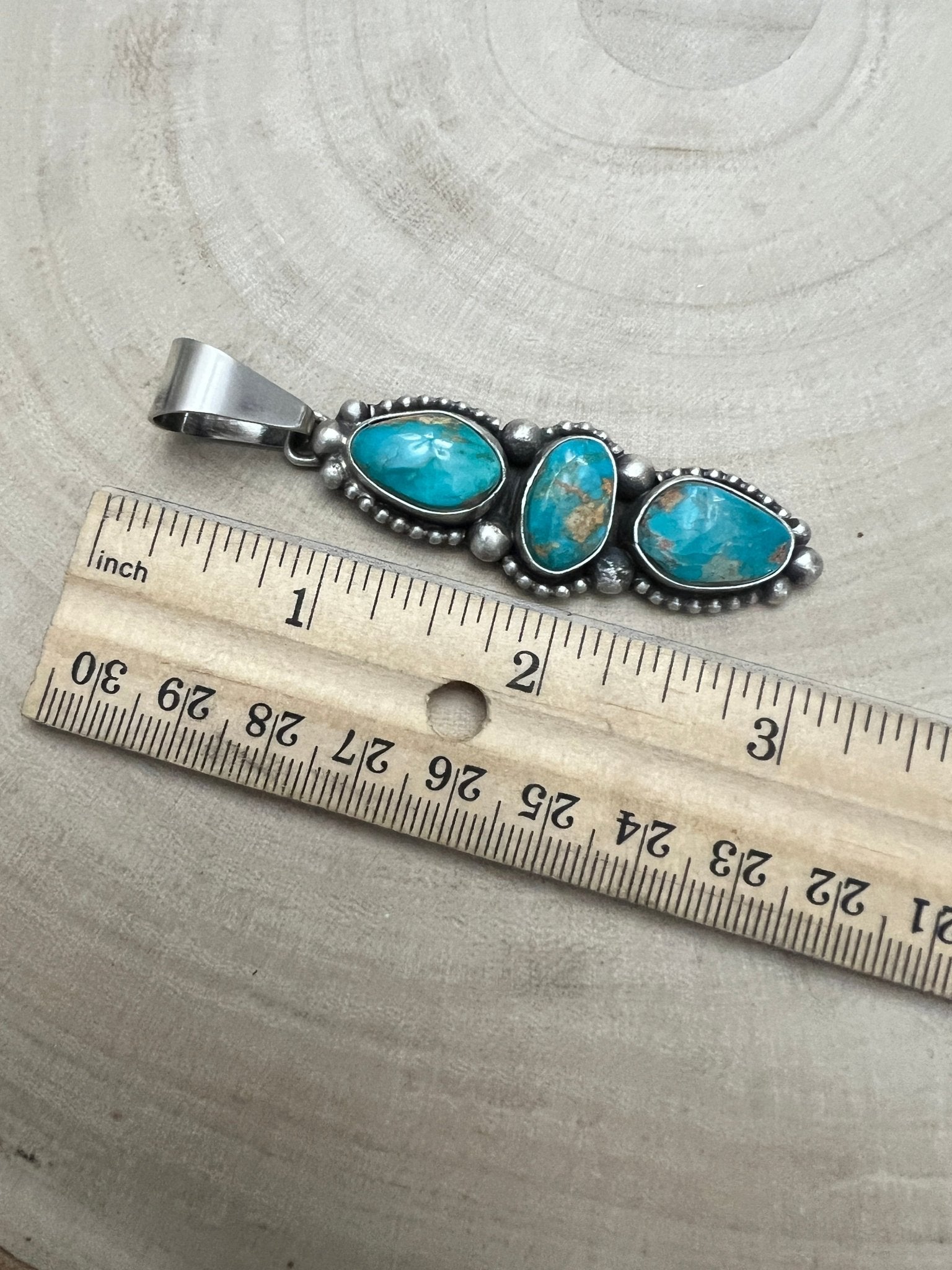 Darrin Livingston Navajo Sterling Silver Pendant with Natural Royston Turquoise — 3" × 3/4" (Hallmark) - Cowhide and Conchos