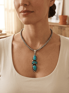 Darrin Livingston Navajo Sterling Silver Pendant with Natural Royston Turquoise — 3" × 3/4" (Hallmark) - Cowhide and Conchos