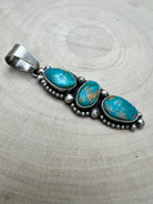 Darrin Livingston Navajo Sterling Silver Pendant with Natural Royston Turquoise — 3" × 3/4" (Hallmark) - Cowhide and Conchos