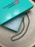Dorinda Mariano Sterling Silver Navajo Pearl Necklace — 22 inch (Handcrafted, Maker's Stamped) - Cowhide and Conchos