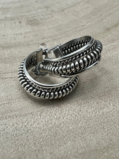 Elaine Tahe Sterling Silver Hoop Earrings - Cowhide and Conchos