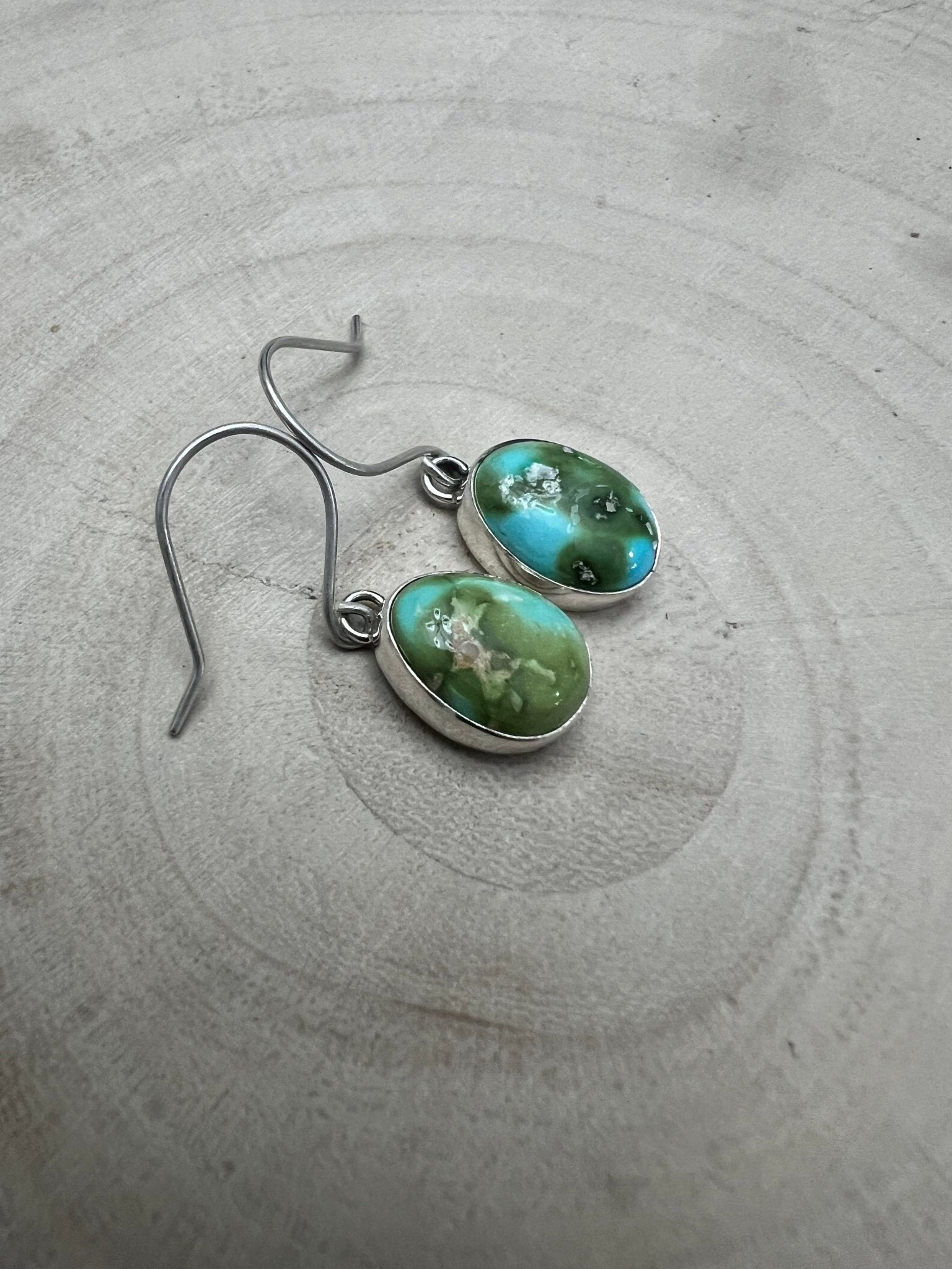 Eugene Gruber Sonoran Turquoise Earrings — 1 1/4" × 3/8" - Cowhide and Conchos
