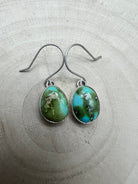 Eugene Gruber Sonoran Turquoise Earrings — 1 1/4" × 3/8" - Cowhide and Conchos