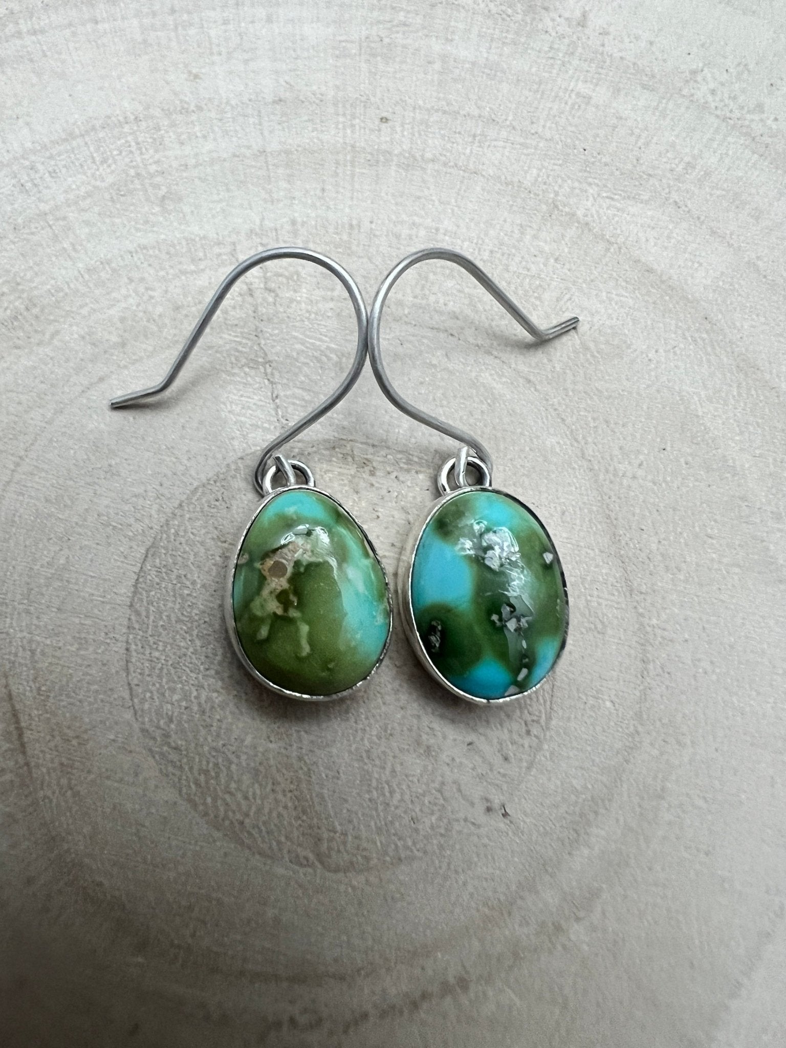 Eugene Gruber Sonoran Turquoise Earrings — 1 1/4" × 3/8" - Cowhide and Conchos