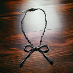 Faux Bow Necklace - Cowhide and Conchos