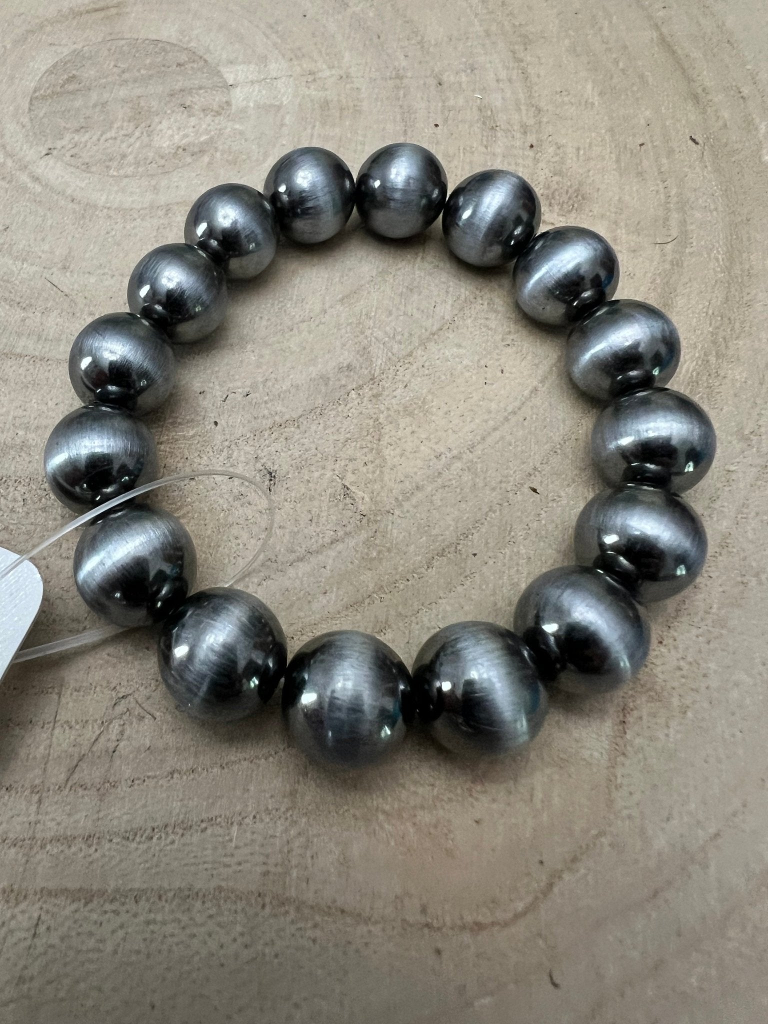 Faux Sterling Pearl Stretch Bracelet - 11 mm faux pearls - Cowhide and Conchos