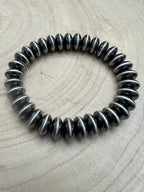 Faux Sterling Saucer Stretch Bracelet - 10 mm faux saucers - Cowhide and Conchos