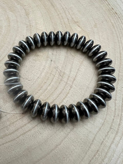 Faux Sterling Saucer Stretch Bracelet - 10 mm faux saucers - Cowhide and Conchos