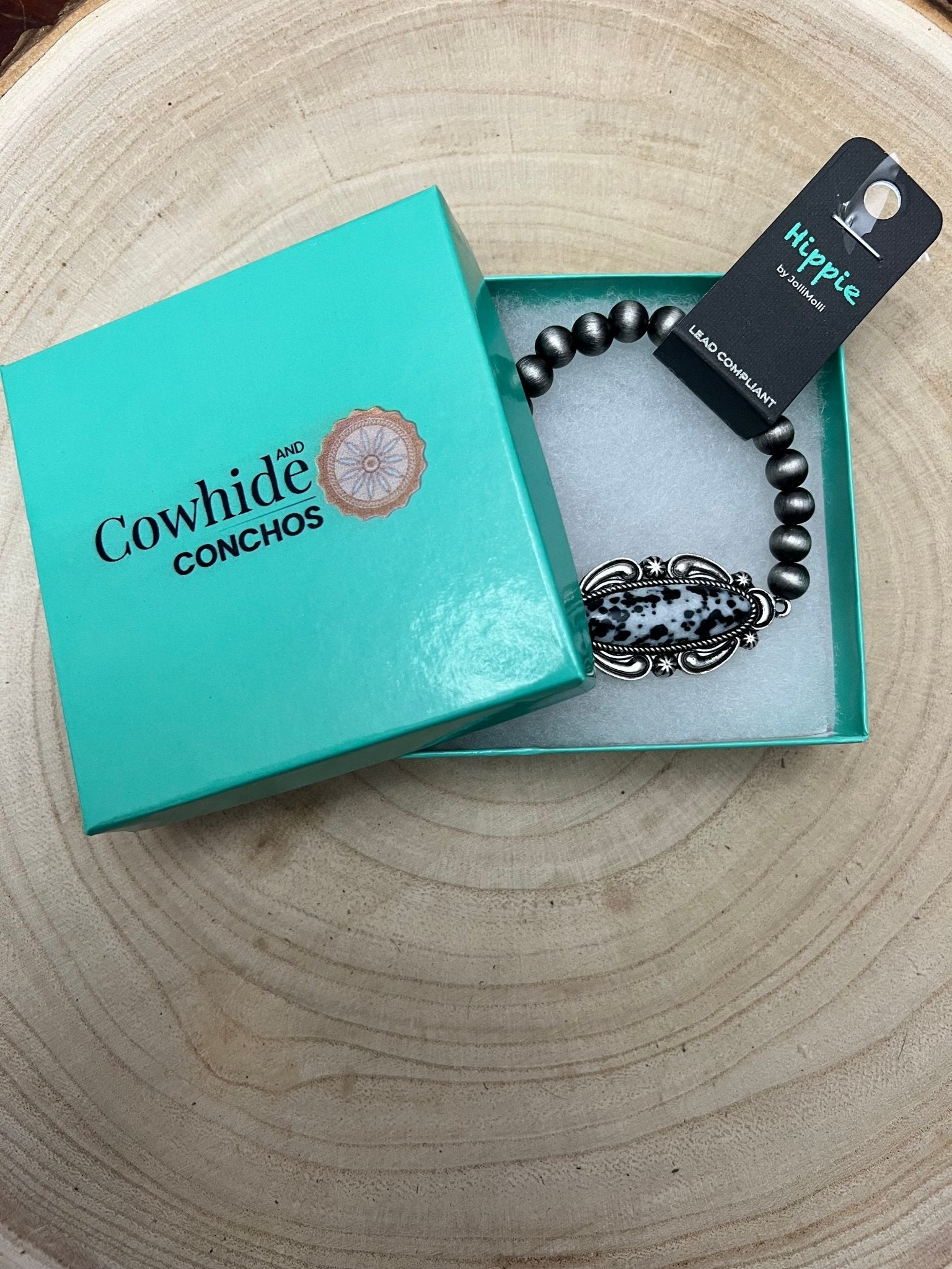 Faux White Buffalo Stretch Bracelet - Cowhide and Conchos