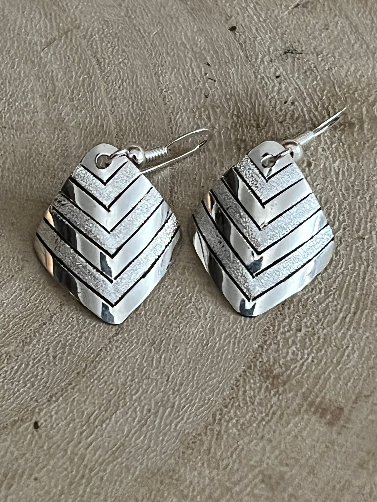 Florence Tahe Navajo Handmade Sterling silver Earrings - Cowhide and Conchos