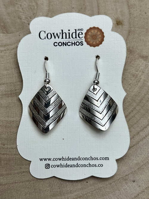 Florence Tahe Navajo Handmade Sterling silver Earrings - Cowhide and Conchos