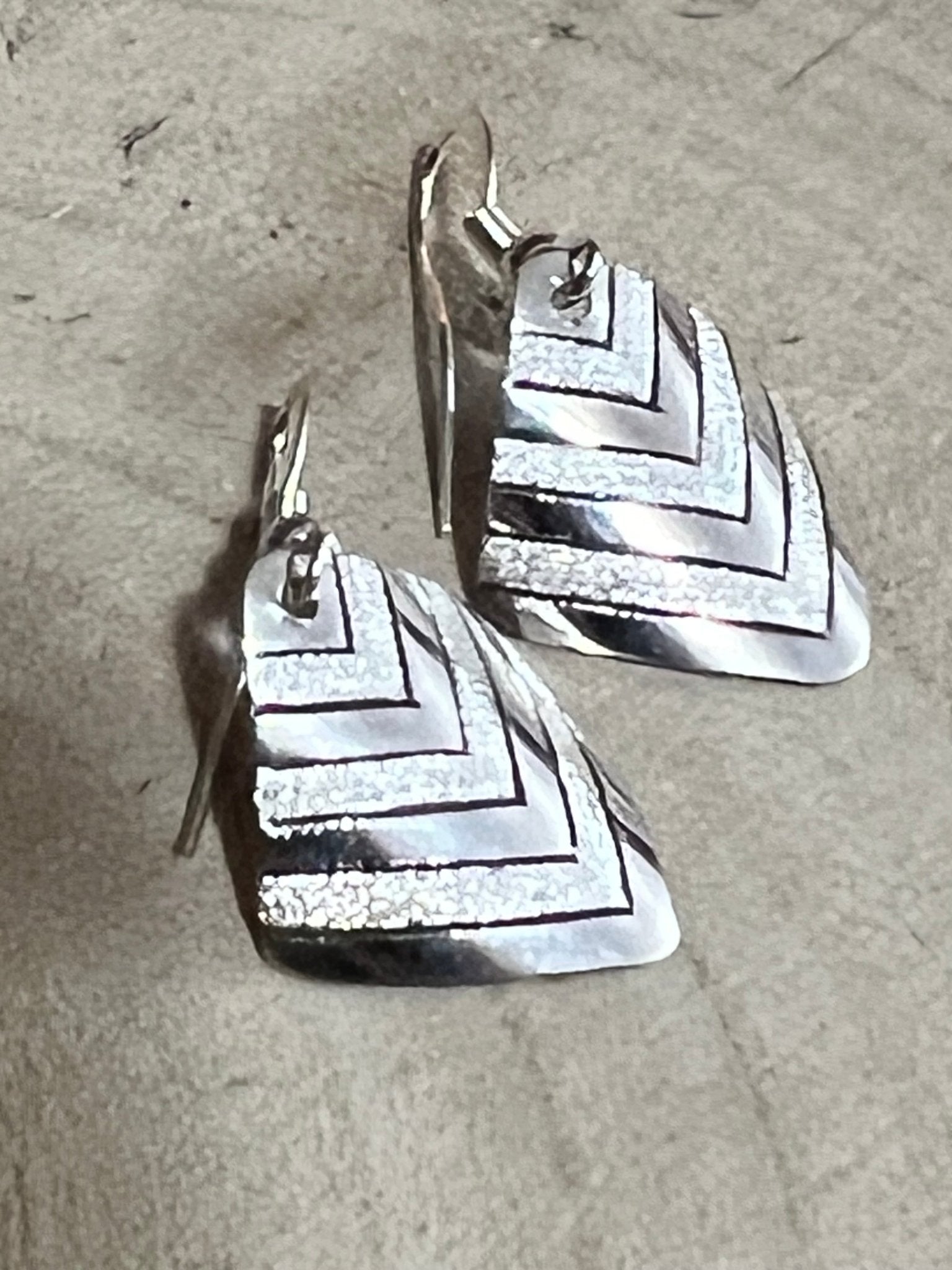 Florence Tahe Navajo Handmade Sterling silver Earrings - Cowhide and Conchos