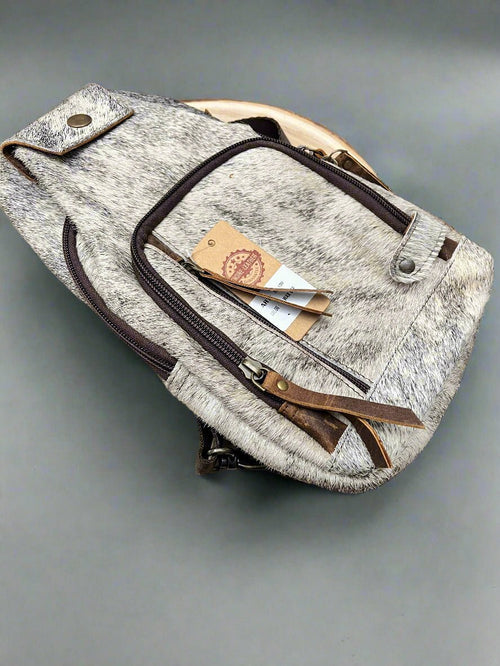 Genuine Hair on Hide Sling Bag - Cowhide and Conchos