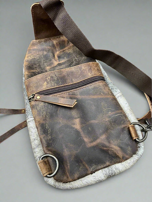 Genuine Hair on Hide Sling Bag - Cowhide and Conchos
