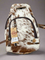 Genuine Hair on Hide Sling Bag - Cowhide and Conchos
