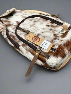 Genuine Hair on Hide Sling Bag - Cowhide and Conchos