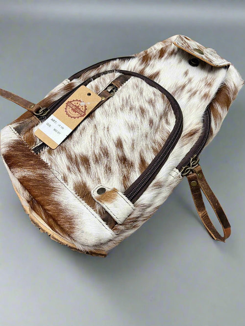 Genuine Hair on Hide Sling Bag - Cowhide and Conchos