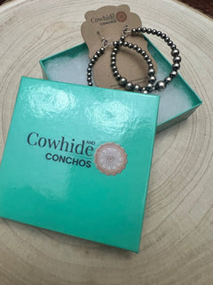 Graduated Sterling Silver Pearl Hoops - Cowhide and Conchos