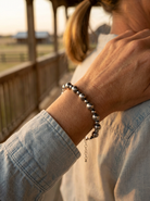 Close-up of the Cowhide & Conchos 3mm & 6mm Sterling Pearl Bracelet on the wrist — mixed-bead sterling detail, modern Western classic.