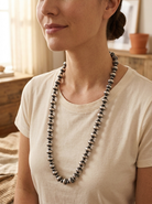 Close-up of the Cowhide & Conchos Saucer Sterling Pearl Statement Necklace — lustrous saucer-shaped pearls, premium Western statement.