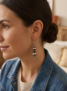 Close-up of the Cowhide & Conchos Dorinda Mariano Navajo Pearl Earrings — authentic sterling silver Navajo pearl detail, heirloom Western style.